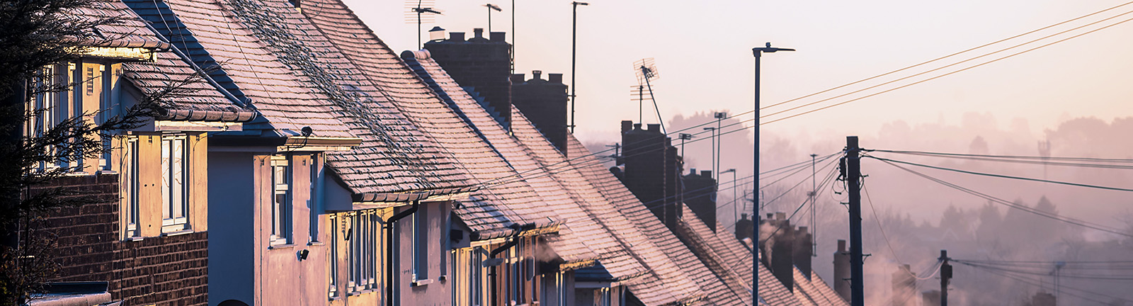 Frost on the roofs' of a row of houses 