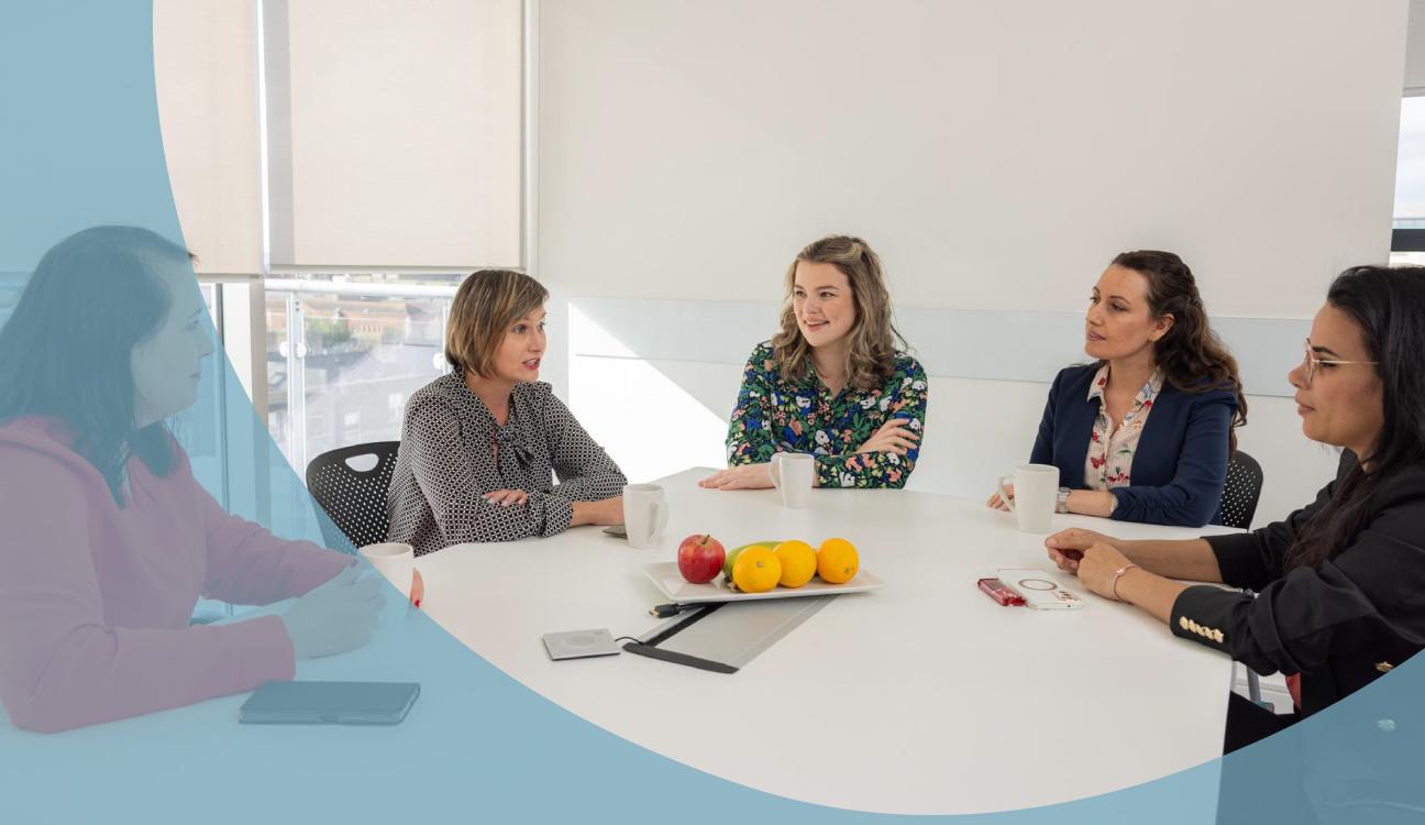 Uisce Éireann employees in an office having a meeting