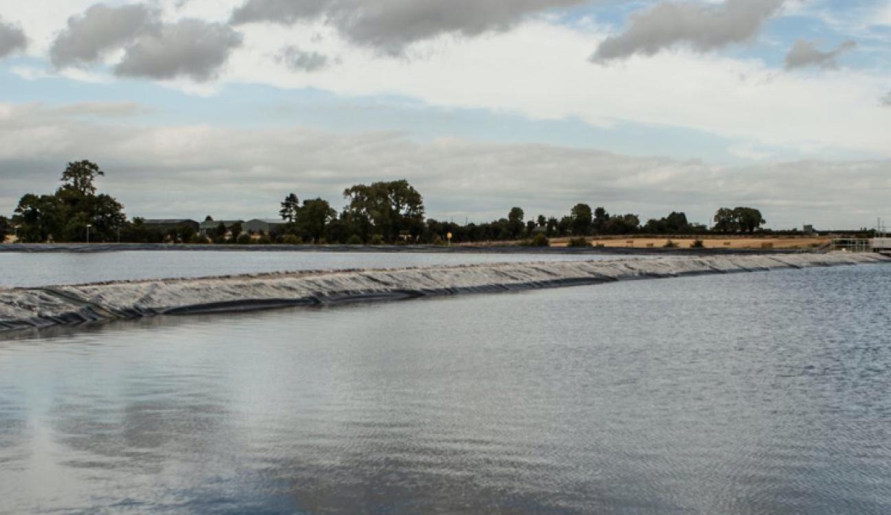 A large body of water being filtered through black fabric